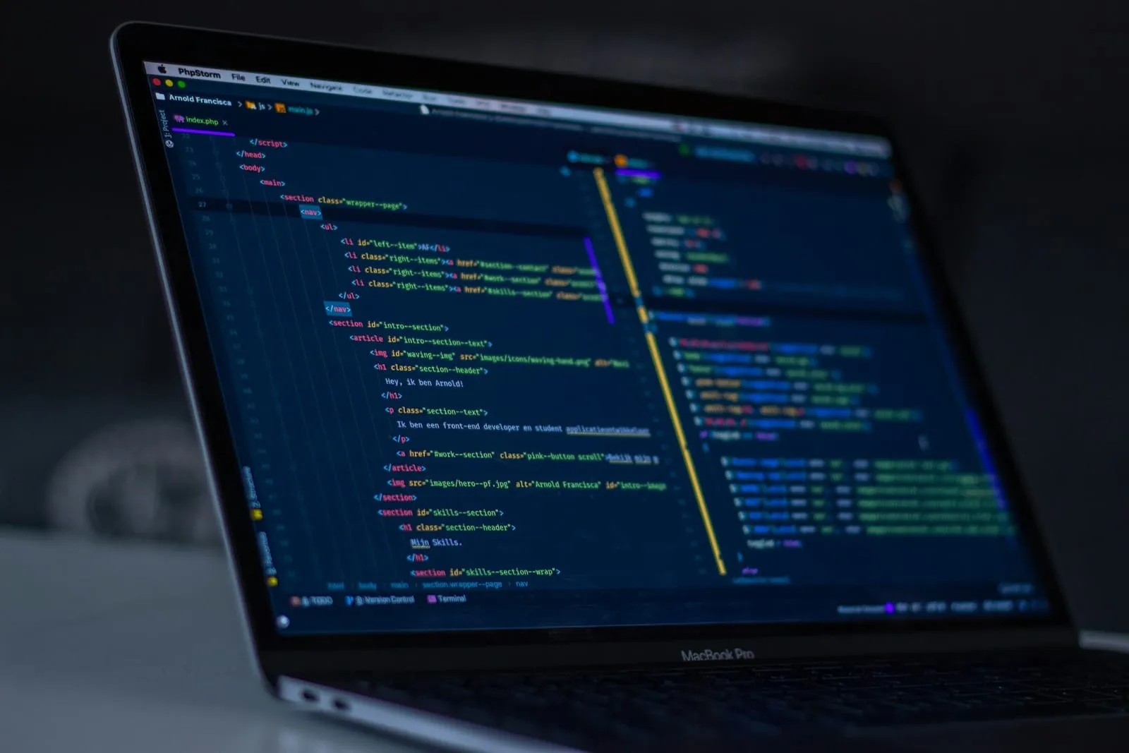 Close-up of source code in an editor on a laptop screen.